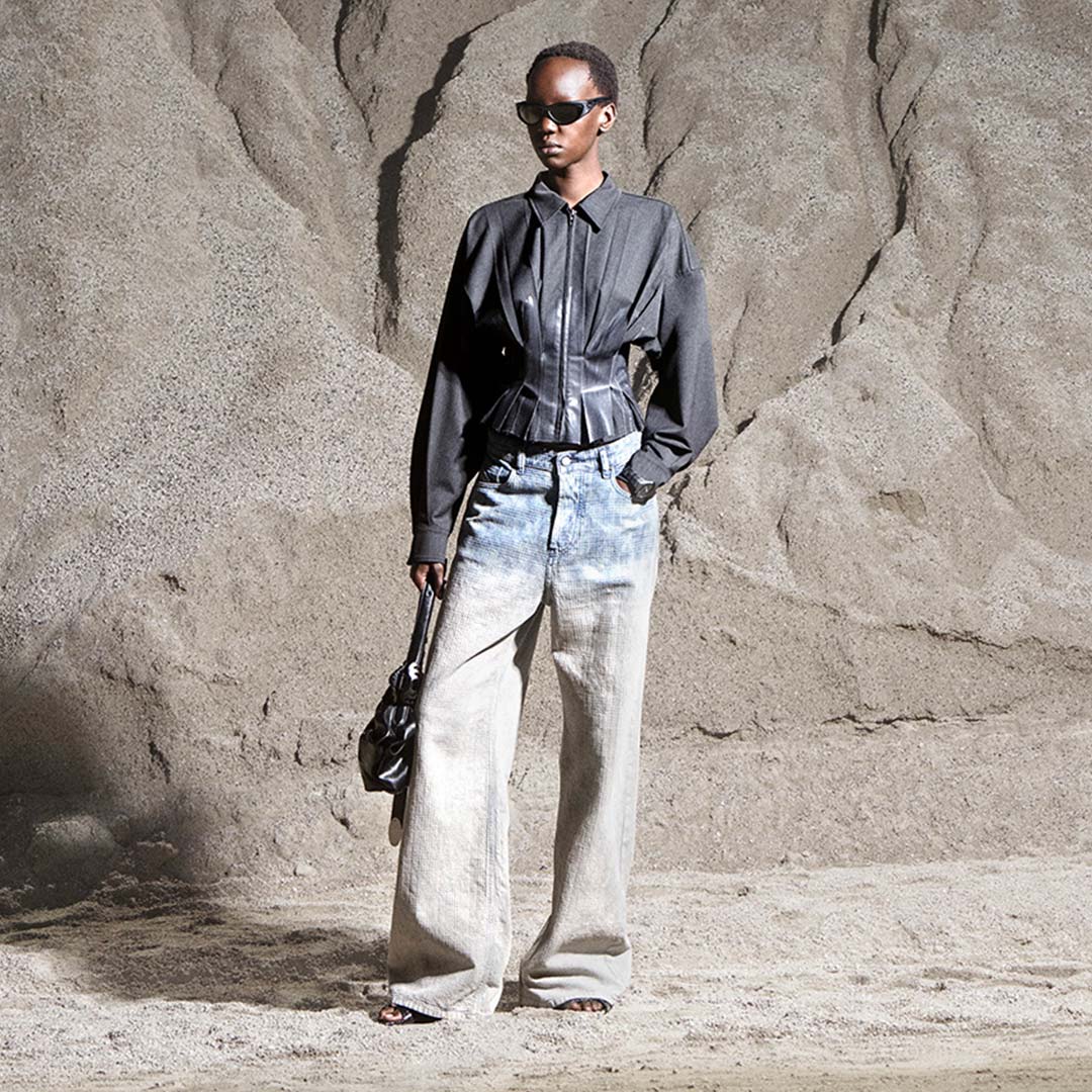 A woman wearing Diesel jeans